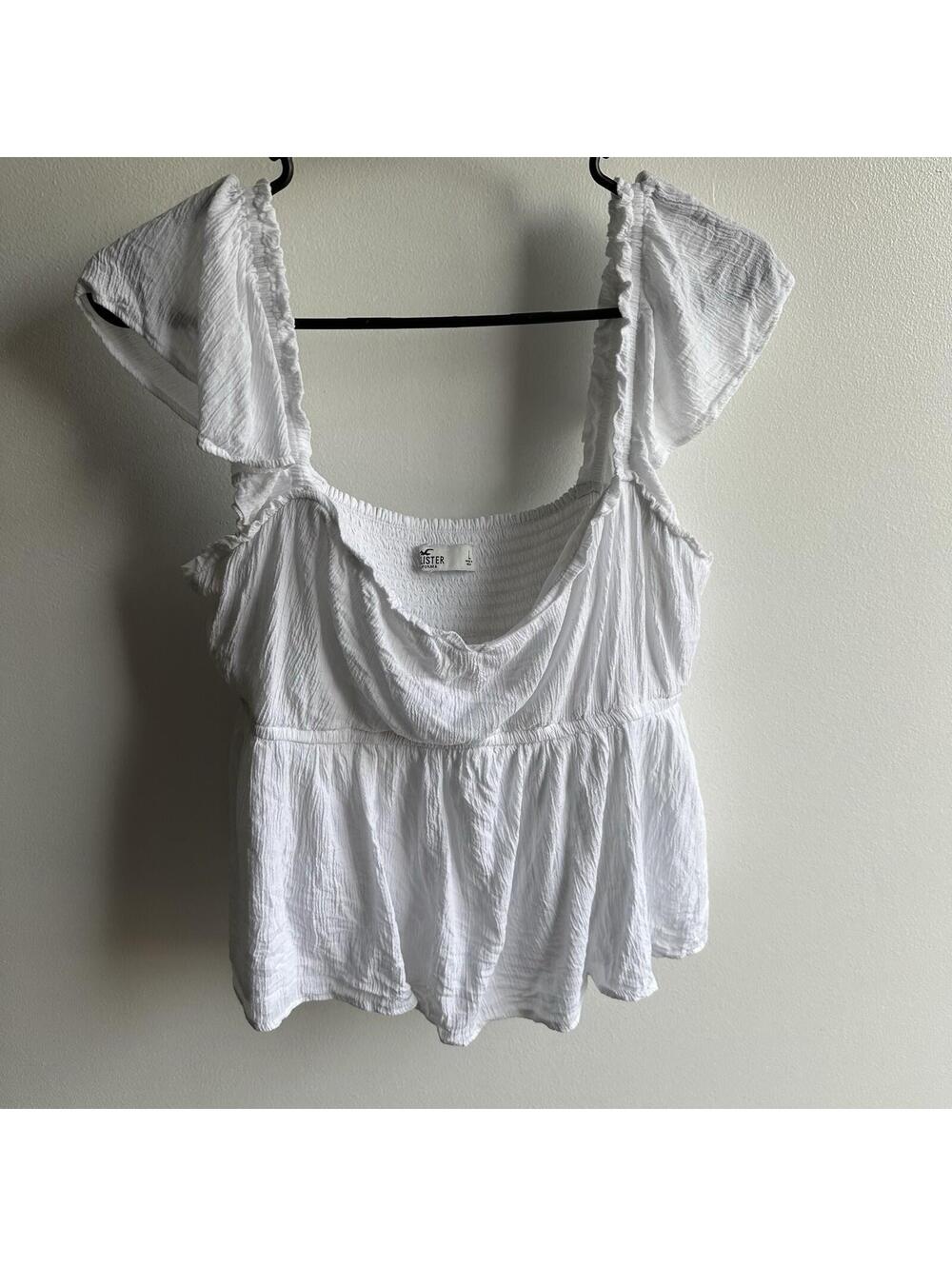Hollister white smocked babydoll Style top with flutter cap sleeves L